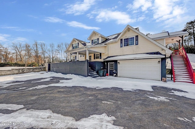 view of front of property featuring a garage