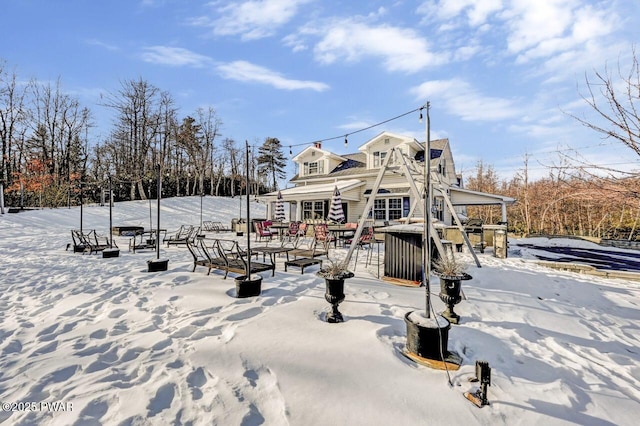 view of snow covered property