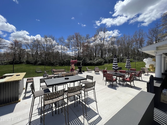 2557 Long Pond Rd, Long Pond, PA 18334 - view of patio / terrace with outdoor dining area and view of wooded area