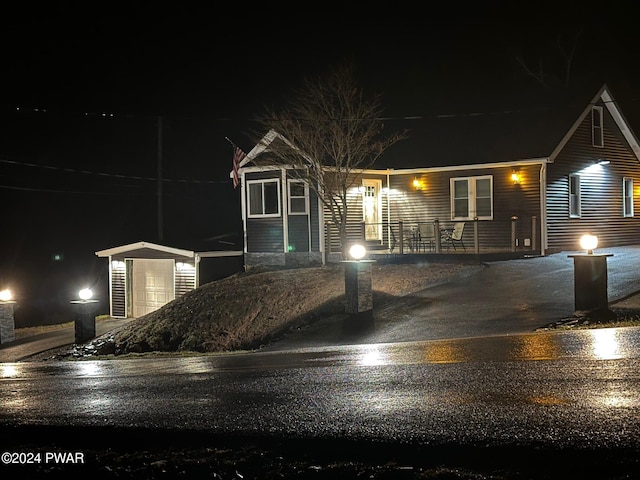 214 Twin Lakes Rd, Shohola, PA 18458 - ranch-style home with a porch