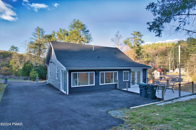 214 Twin Lakes Rd, Shohola, PA 18458 - rear view of property with roof with shingles and a wooden deck