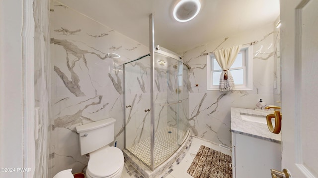 bathroom with vanity, toilet, an enclosed shower, and tile walls