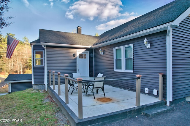 rear view of house featuring a patio area