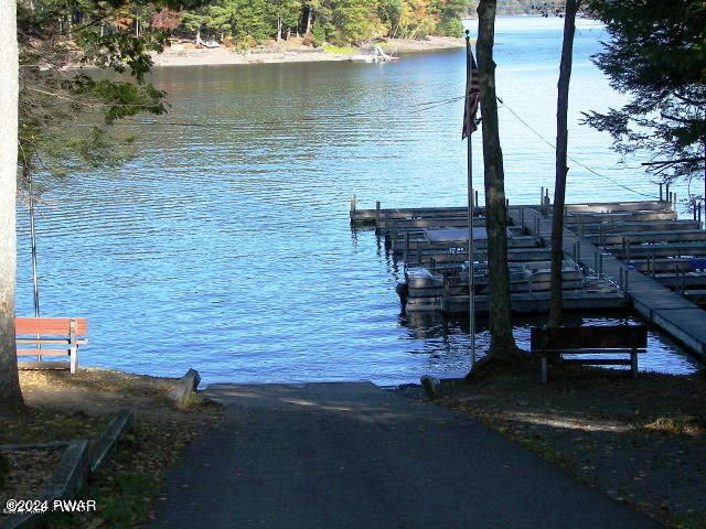 dock area featuring a water view