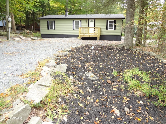 view of front of house featuring a deck