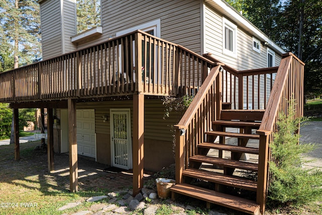 back of property with a deck