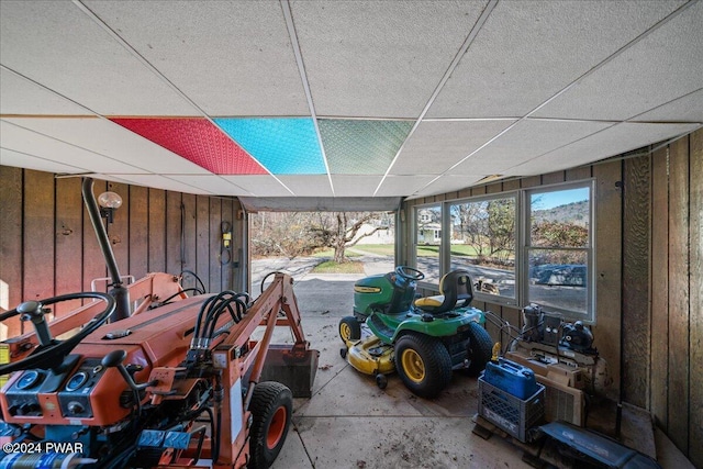 sunroom / solarium with a paneled ceiling