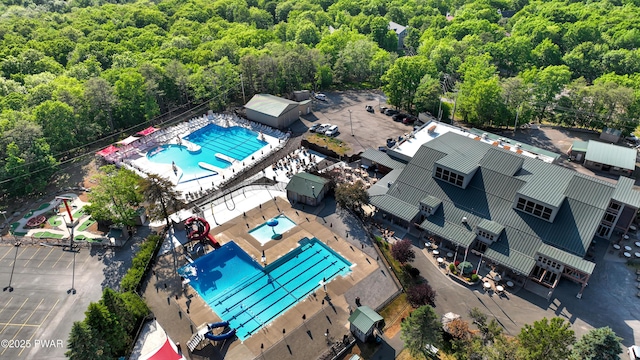 116 Rainbow Dr, Lackawaxen, PA 18435 - aerial view of a pool area and a heavily wooded area