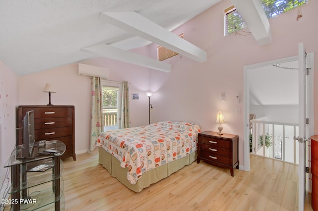 116 Rainbow Dr, Lackawaxen, PA 18435 - bedroom with light wood-style flooring, a skylight, baseboards, and access to outside