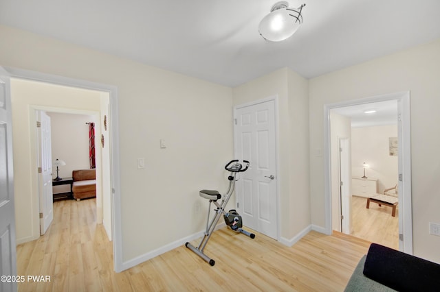 116 Rainbow Dr, Lackawaxen, PA 18435 - workout area with light wood-type flooring and baseboards