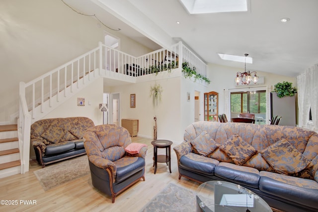 116 Rainbow Dr, Lackawaxen, PA 18435 - living area featuring a skylight, a chandelier, stairs, light wood-style floors, and recessed lighting