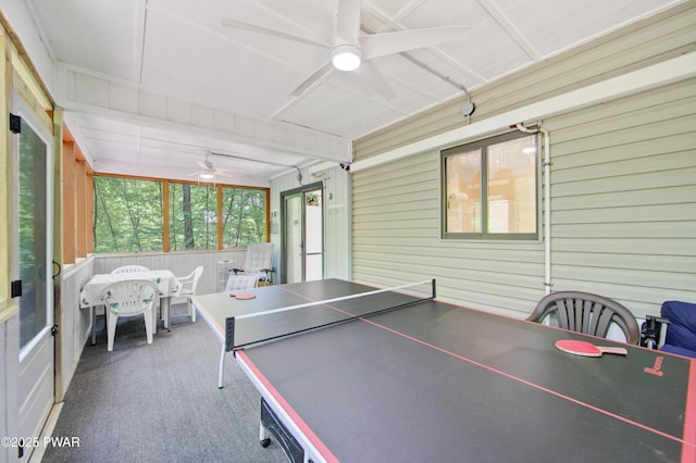 116 Rainbow Dr, Lackawaxen, PA 18435 - rec room with ceiling fan, wood walls, and carpet flooring