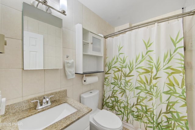 116 Rainbow Dr, Lackawaxen, PA 18435 - bathroom with tile walls, vanity, toilet, tasteful backsplash, and a shower with curtain