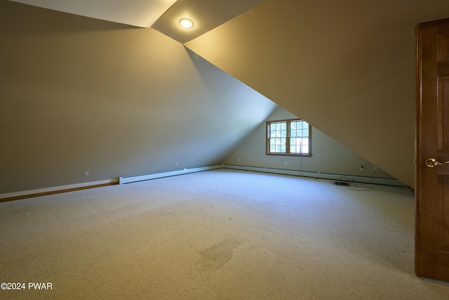 bonus room featuring carpet floors and vaulted ceiling