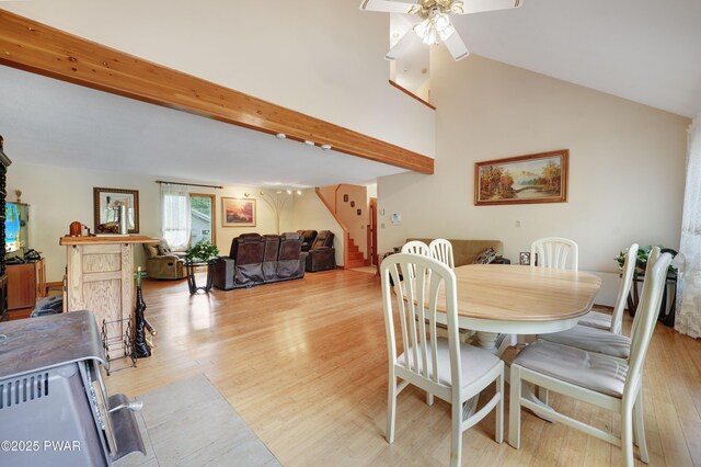 380 Falling Waters Blvd, Lackawaxen, PA 18435 - dining space with stairs, light wood finished floors, ceiling fan, and lofted ceiling