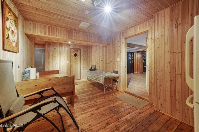 380 Falling Waters Blvd, Lackawaxen, PA 18435 - bedroom with wood walls, hardwood / wood-style floors, and wood ceiling