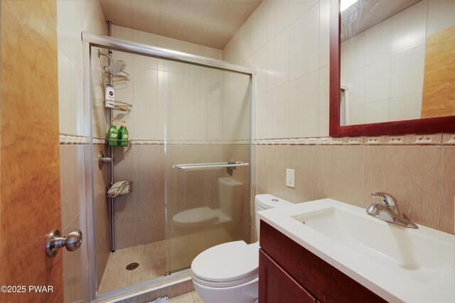 380 Falling Waters Blvd, Lackawaxen, PA 18435 - full bath with tile walls, toilet, a stall shower, and vanity