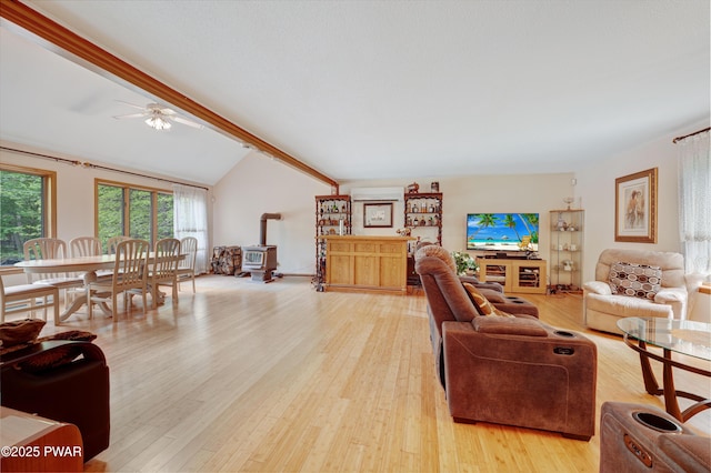 380 Falling Waters Blvd, Lackawaxen, PA 18435 - living area with a wood stove, light wood-type flooring, and ceiling fan