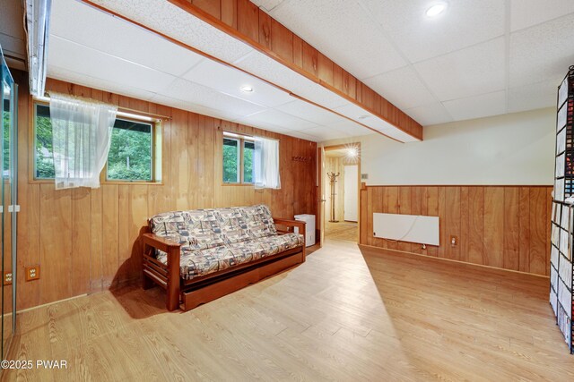 380 Falling Waters Blvd, Lackawaxen, PA 18435 - sitting room featuring wood walls, wood finished floors, and a wainscoted wall