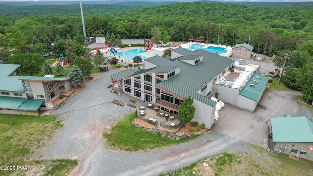 380 Falling Waters Blvd, Lackawaxen, PA 18435 - drone / aerial view of a heavily wooded area and a pool