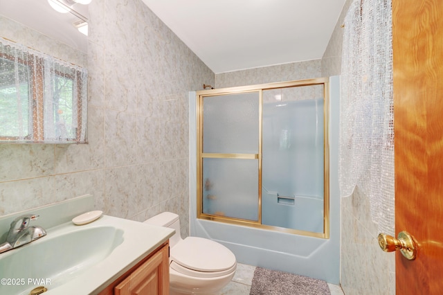 380 Falling Waters Blvd, Lackawaxen, PA 18435 - full bath featuring vanity, toilet, shower / bath combination with glass door, tile patterned floors, and tile walls