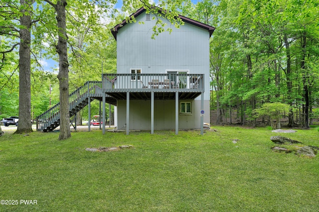 380 Falling Waters Blvd, Lackawaxen, PA 18435 - back of property featuring stairs, a wooden deck, and a yard