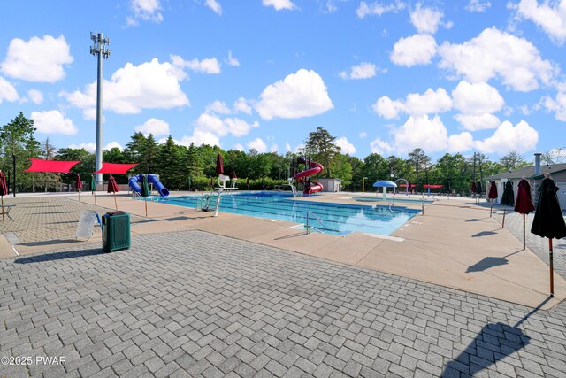 380 Falling Waters Blvd, Lackawaxen, PA 18435 - community pool with a water slide and a patio area