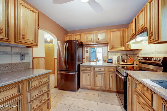 380 Falling Waters Blvd, Lackawaxen, PA 18435 - kitchen with stainless steel appliances, under cabinet range hood, arched walkways, a ceiling fan, and decorative backsplash