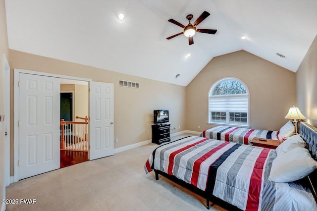 bedroom with lofted ceiling, visible vents, carpet flooring, ceiling fan, and baseboards