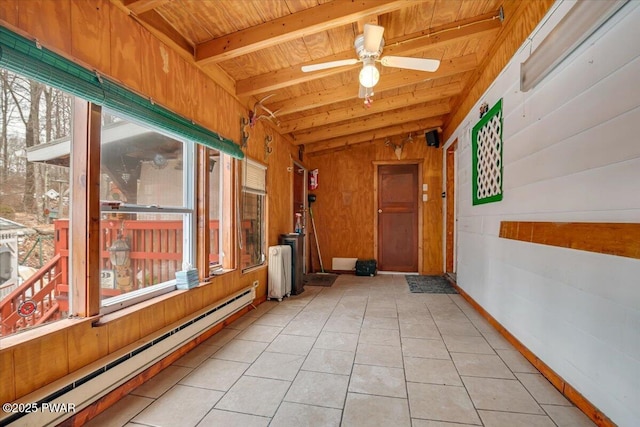 interior space featuring wood ceiling, a baseboard radiator, ceiling fan, and vaulted ceiling with beams