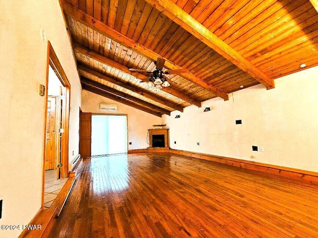 unfurnished living room with lofted ceiling with beams, light hardwood / wood-style flooring, ceiling fan, and wood ceiling