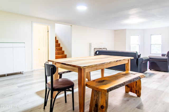 dining space featuring light hardwood / wood-style floors