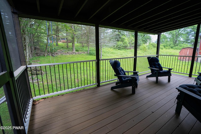 28 Woodcrest Ln, Lake Ariel, PA 18436 - wooden deck with a storage shed and a lawn
