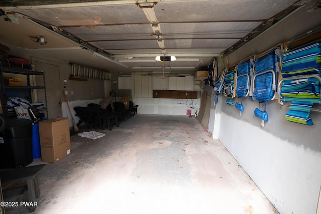 28 Woodcrest Ln, Lake Ariel, PA 18436 - garage featuring a garage door opener