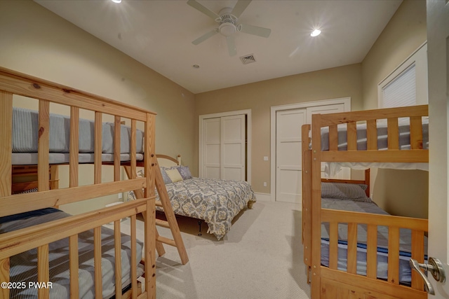 130 Calico Ct, Paupack, PA 18451 - carpeted bedroom with baseboards, visible vents, and two closets