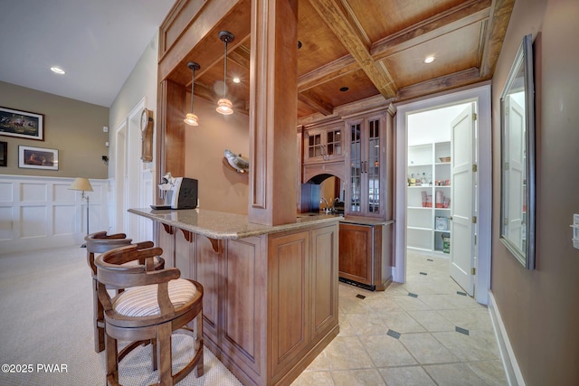 130 Calico Ct, Paupack, PA 18451 - bar featuring beamed ceiling, wet bar, hanging light fixtures, a decorative wall, and coffered ceiling