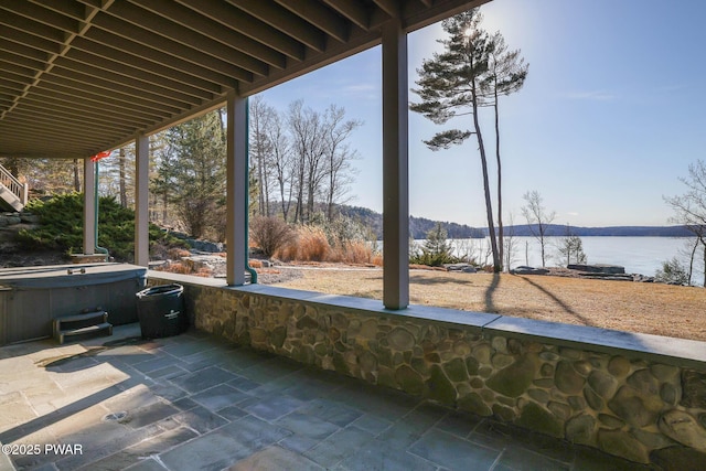 130 Calico Ct, Paupack, PA 18451 - view of patio with a water view and a hot tub