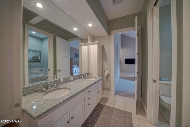 130 Calico Ct, Paupack, PA 18451 - bathroom with visible vents, toilet, a sink, tile patterned flooring, and double vanity