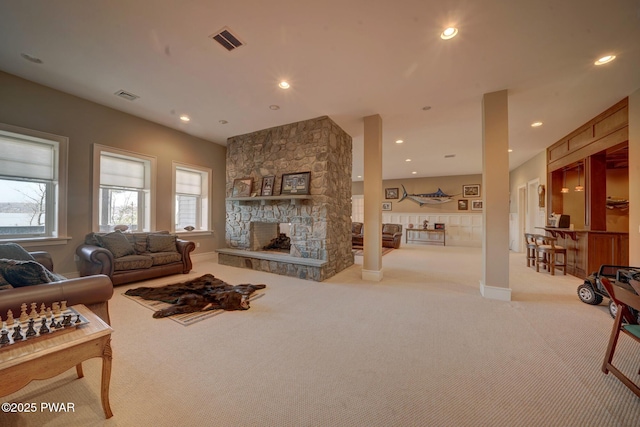 130 Calico Ct, Paupack, PA 18451 - carpeted living area with recessed lighting, visible vents, baseboards, and a stone fireplace