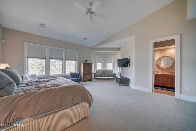 130 Calico Ct, Paupack, PA 18451 - carpeted bedroom featuring visible vents, connected bathroom, high vaulted ceiling, and baseboards