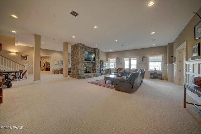130 Calico Ct, Paupack, PA 18451 - living area with recessed lighting, visible vents, a stone fireplace, and carpet flooring