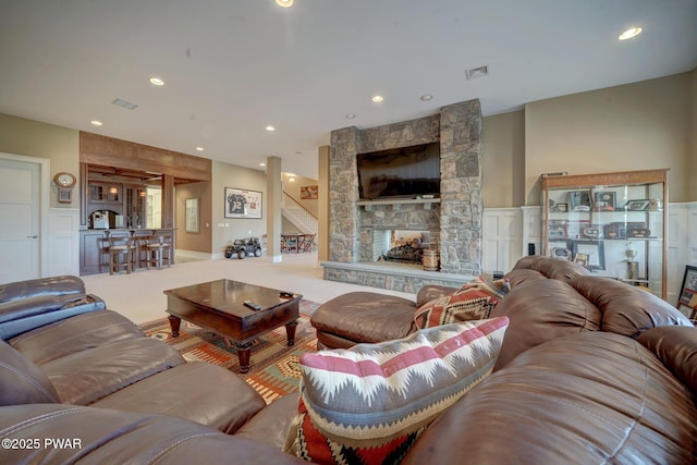 130 Calico Ct, Paupack, PA 18451 - carpeted living area featuring stairway, recessed lighting, a fireplace, and visible vents