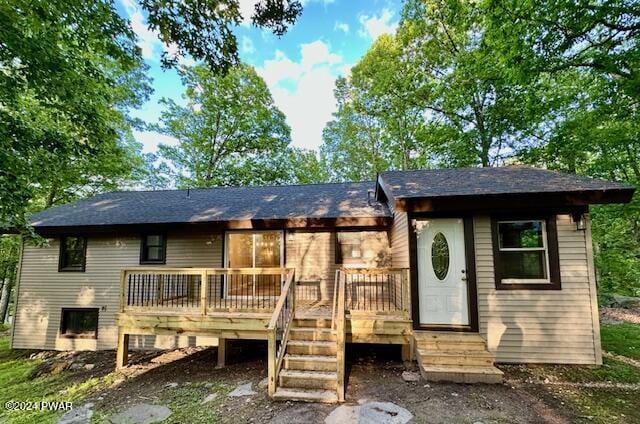 106 Rodeo Ln, Lords Valley, PA 18428 - back of property featuring a deck