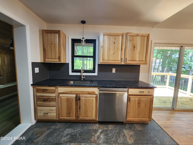 106 Rodeo Ln, Lords Valley, PA 18428 - kitchen with stainless steel dishwasher, dark countertops, decorative backsplash, and light brown cabinetry