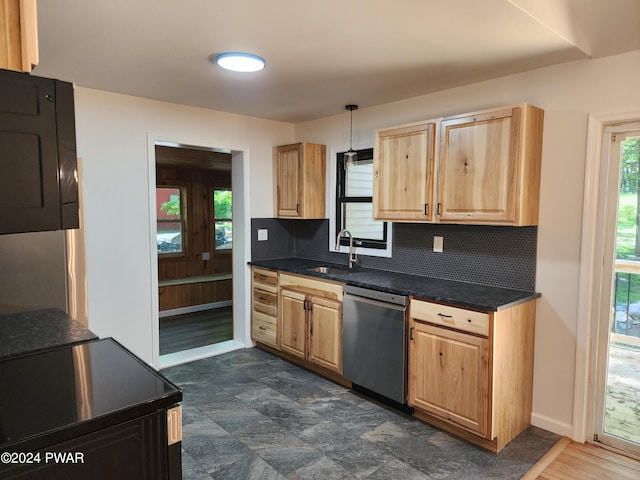 106 Rodeo Ln, Lords Valley, PA 18428 - kitchen with stainless steel dishwasher, tasteful backsplash, light brown cabinetry, and dark countertops