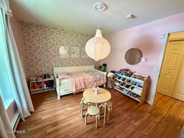 bedroom with wood-type flooring