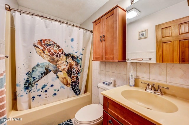 full bathroom featuring vanity, shower / bath combo, backsplash, and toilet