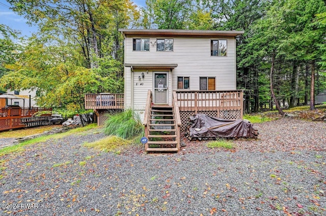 view of property with a wooden deck