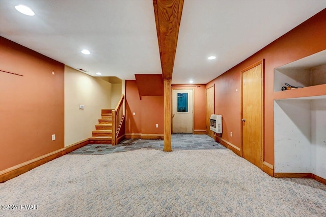 basement with carpet floors and heating unit