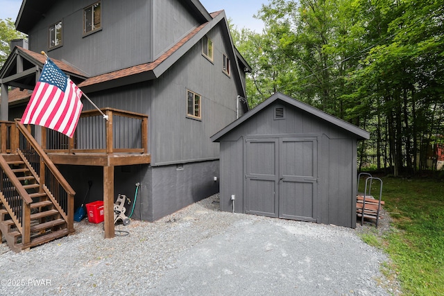 1706 Windemere Ct, Lake Ariel, PA 18436 - back of house with a shed, stairs, a deck, and roof with shingles